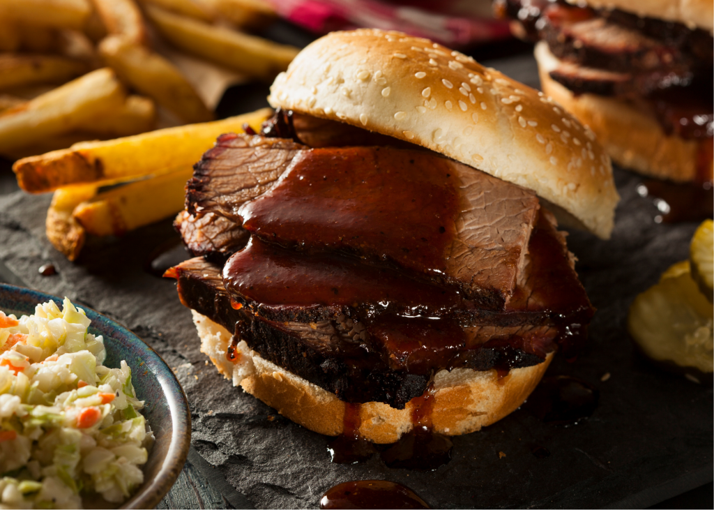 sandwich with beef brisket, fries and coleslaw