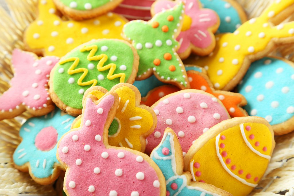 Colorful easter cookies in basket