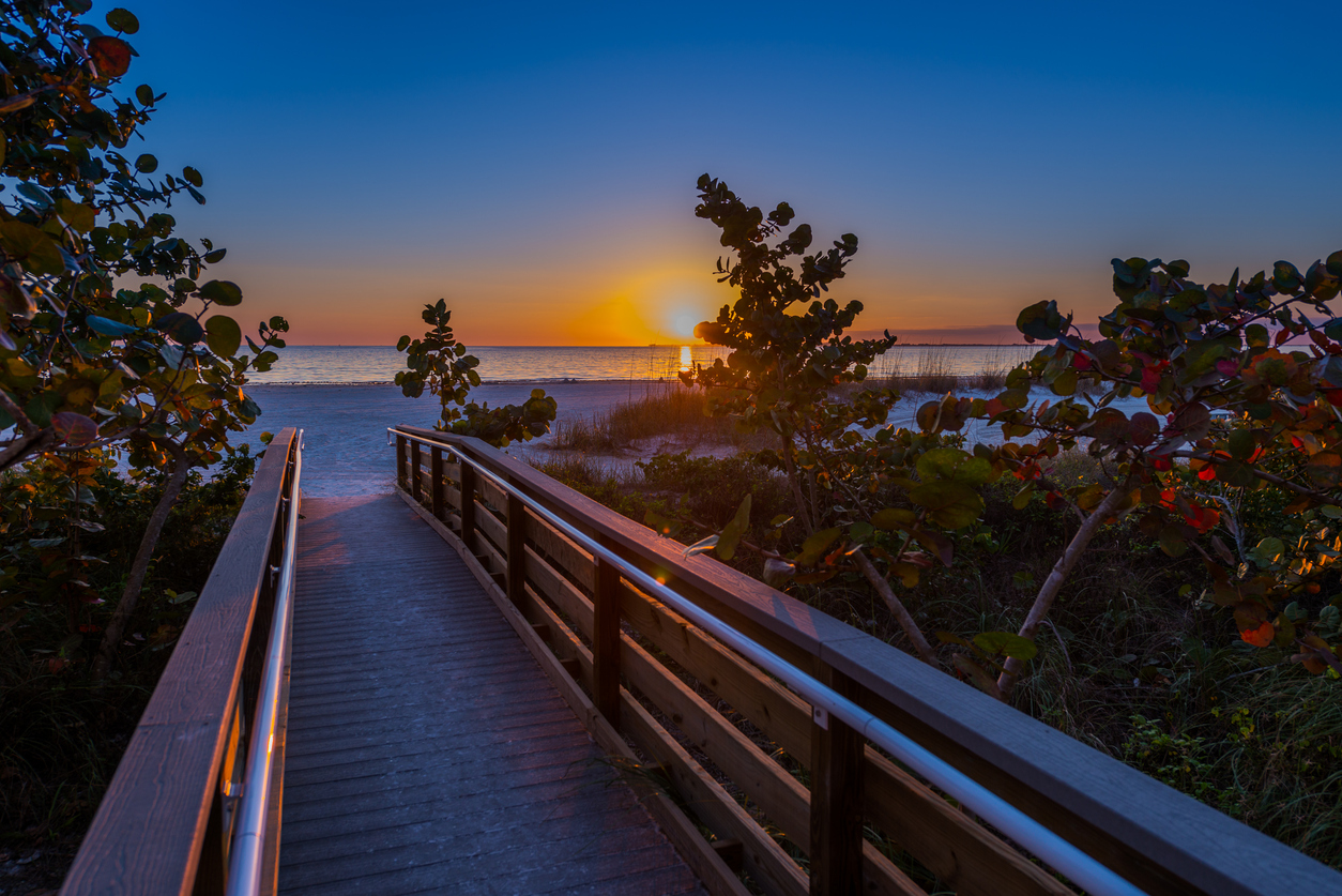 Footbridge to the beach at Anna Maria Island during sunset